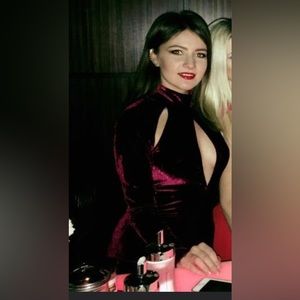 Worn once for a Christmas party. Sexy cut out burgundy velvet dress.